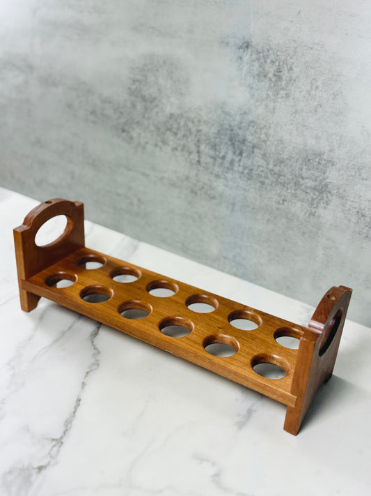 Detail of the handmade cherry wood egg holder