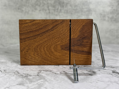 Hardwood cheese slicer showing the natural wood grain