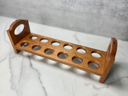 Cherry wood egg holder showing the natural wood grain