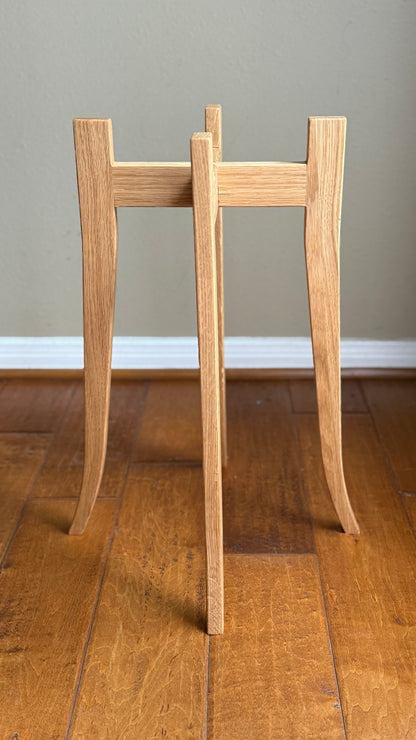 White oak plant stand showing its four-leg design
