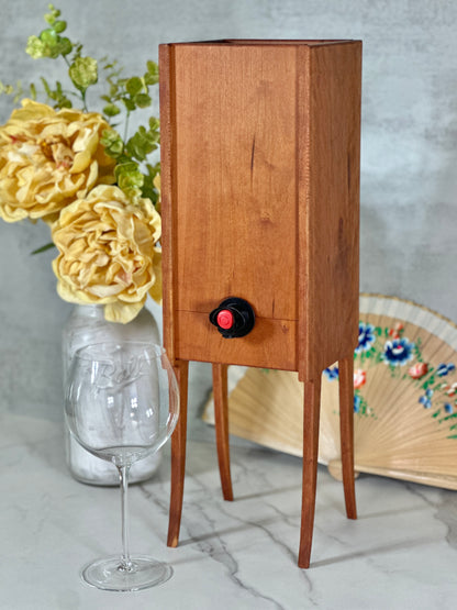 Close view of the wooden box wine dispenser