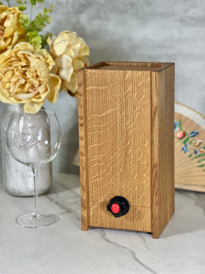 Detail of the wooden box wine dispenser