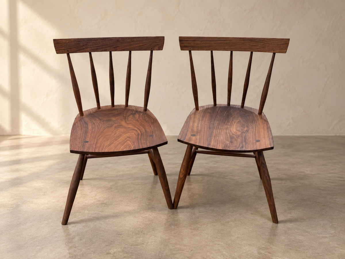 Matching pair of handcrafted walnut chairs